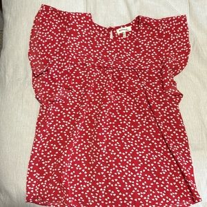 Red heart filled blouse.